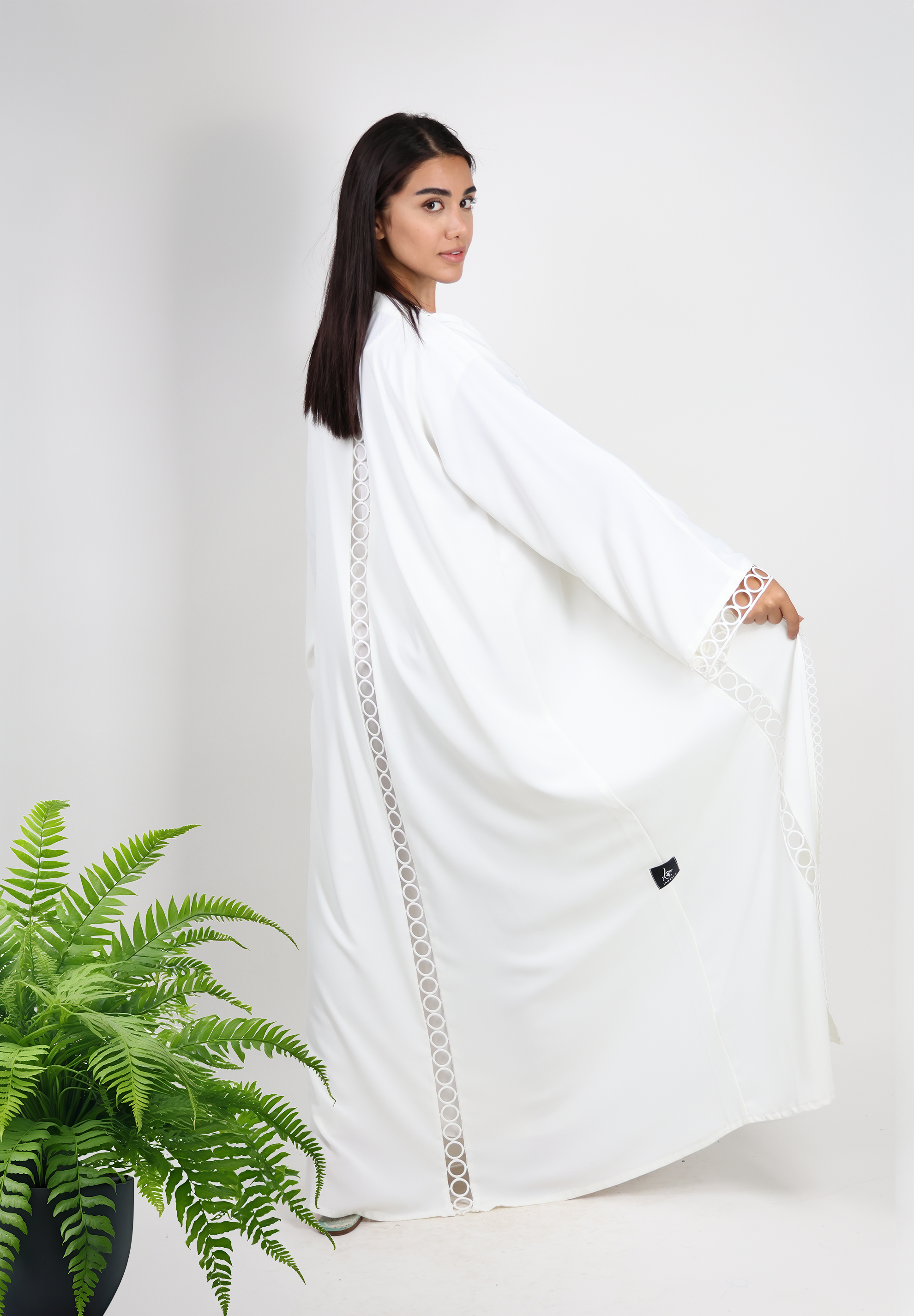 Pristine White Abaya with Contemporary Cut-Out Details